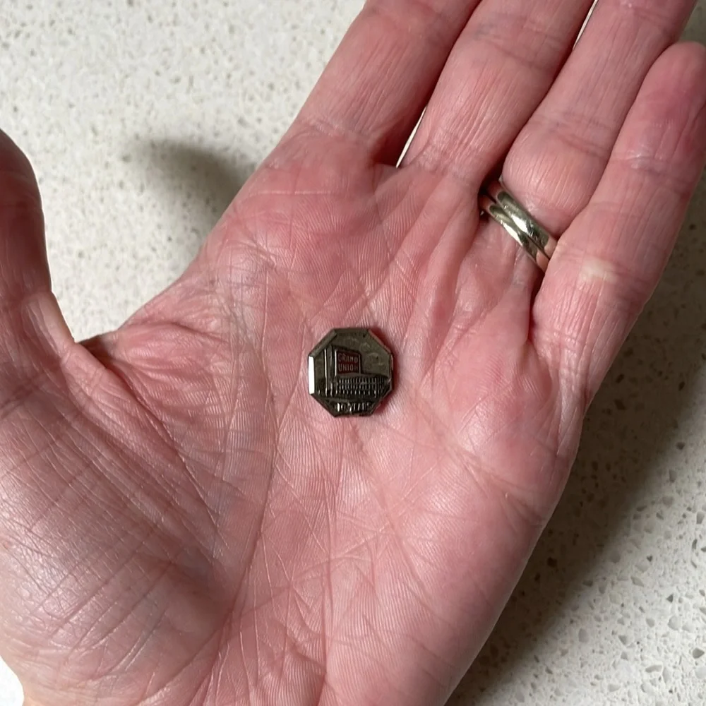 Vintage sterling silver Grand Union 10 year collectible lapel pin